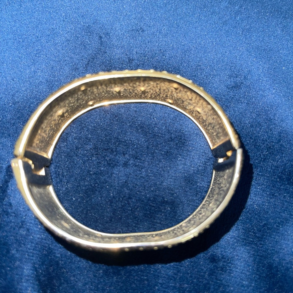 Vintage Rhinestones Gold Tone beautiful on
Hard Hinged Bangle Bracelet 2 1/2” W - Picture 4 of 5